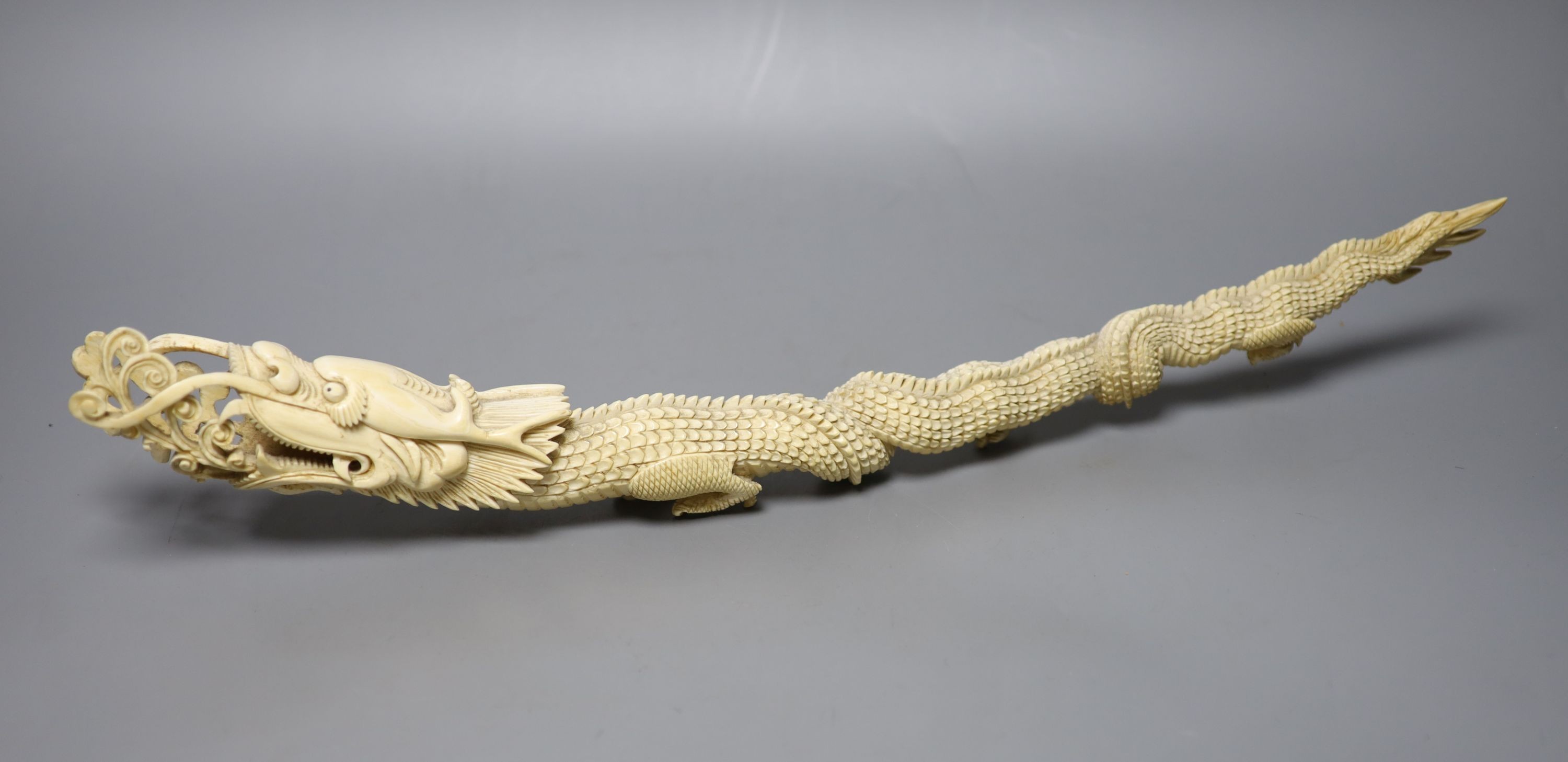 An Indonesian ivory carving of a dragon, first half of 20th century 52cm, , An Indonesian ivory carving of a dragon, first half of 20th century